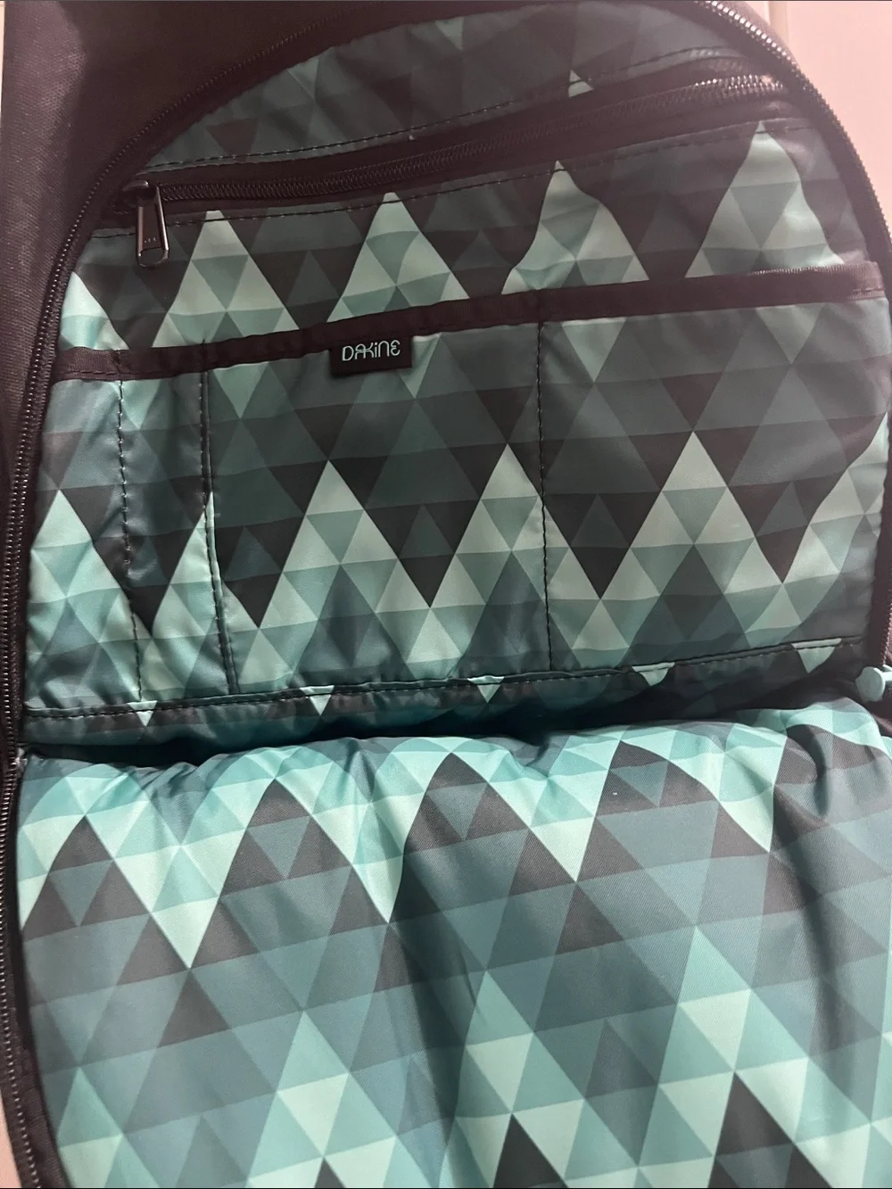 Dakine Black Backpack with Teal Accents